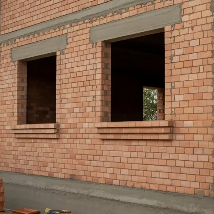 A partially constructed brick house