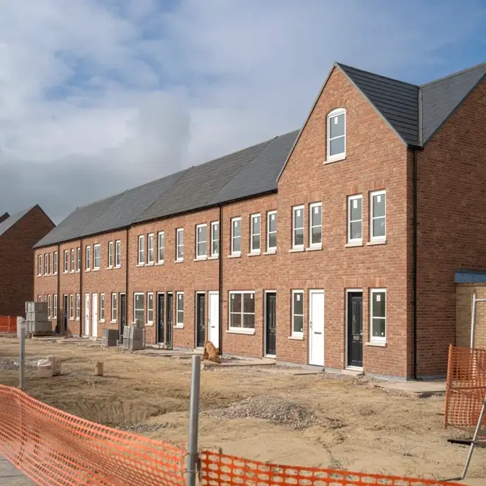 A road of newly finished brick houses